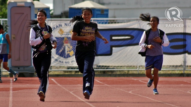 COMPETITIONS LOOMING. Athletes are already training at the Perdices Stadium. Photo by Rappler/Kevin dela Cruz.