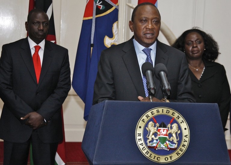 ATTACK OVER. Kenyan President Uhuru Kenyatta (C) speaking during a press conference in Nairobi in front of Kenyan Vice President William Ruto (L) following an attack on the Westgate shopping mall in Nairobi, September 24, 2013. AFP / Kenya Presidential Press Service