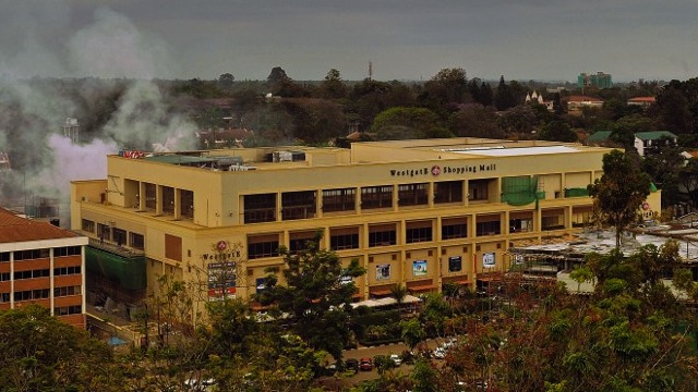AFTER THE SIEGE. Smoke rises from the Westgate mall on September 24, 2013 in Nairobi. AFP/Carl de Souza