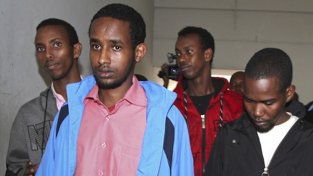 SUSPECTS. (L-R) Adan Mohamed Ibrahim (alias Adan Abdikadir Adan), Mohamed Abdi Ahmed, Hussein Hassan and Liban Abdullah Omar appear for a hearing at a courtroom in Nairobi, Kenya, 04 November 2013. A Kenyan court has charged the four people over the Westgate shopping mall attack in September which left at least 67 people dead. All four deny terrorism charges. EPA/Stringer