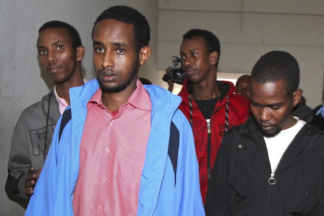 SUSPECTS. (L-R) Adan Mohamed Ibrahim (alias Adan Abdikadir Adan), Mohamed Abdi Ahmed, Hussein Hassan and Liban Abdullah Omar appear for a hearing at a courtroom in Nairobi, Kenya, 04 November 2013. A Kenyan court has charged the four people over the Westgate shopping mall attack in September which left at least 67 people dead. All four deny terrorism charges. EPA/Stringer