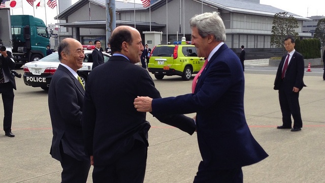 U.S. Secretary of State John Kerry is greeted by John Roos, the U.S. Ambassador to Japan, after arriving at Haneda International Airport in Tokyo, Japan, on April 14, 2013. [State Department photo/ Public Domain]