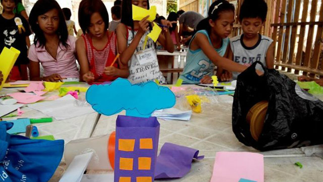 FEEDING MINDS. Children having fun while learning about arts and crafts. Photo from Project Pearls