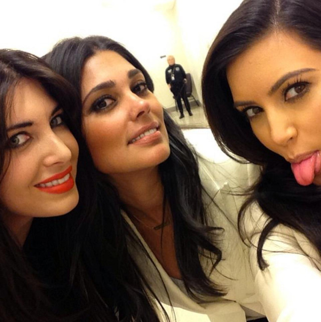 Social media-savvy Kim posted this photo with designer Rachel Roy (middle) and a friend (left) on her Facebook page on December 31, 10 am Manila time