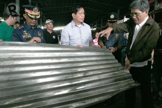 OVERSIGHT FUNCTION. Rehabilitation Secretary Panfilo Lacson joins a raid July 9, 2014, on a warehouse in General Trias, Cavite, that was allegedly involved in building substandard houses for Super Typhoon Yolanda (Haiyan) survivors in Tacloban City. Photo by Jose Del/Rappler