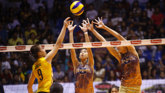 FINISHING KICK. UST's Ennajie Laure (left) caught fire in the fourth set to finish off San Sebastian for their second win in the Shakey's V-League. File Photo by Josh Albelda/Rappler