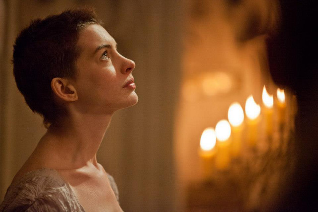 THE WORLD WEEPS AT HER STORY. Anne Hathaway's Fantine. Photos from the 'Les Misérables' Facebook page