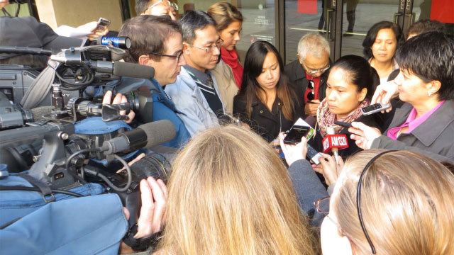 SENTENCED. Leticia Sarmiento faces reporters after sentencing of her former employer. Photo by Stuart Lyster.