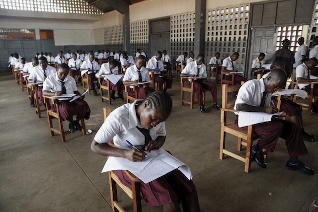 A file photo dated 03 June 2013 shows Liberian students sitting the West Afican Examinations Council (WAEC) exams at G.W. Gibson High School in Monrovia, Liberia. EPA/Ahmed Jallanzo