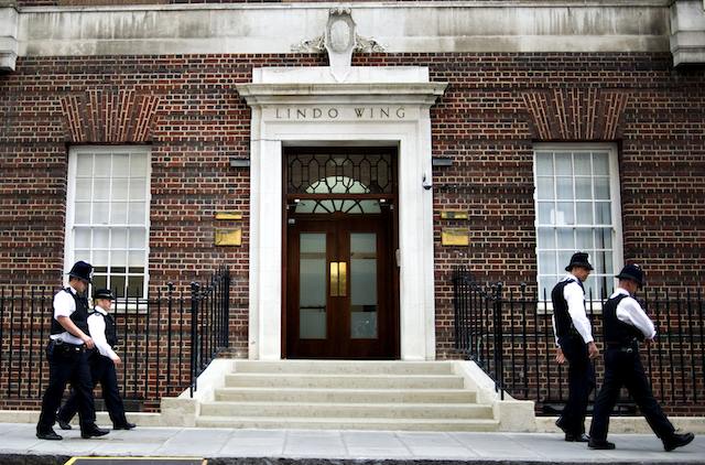 ROYAL BABY ON THE WAY. Police officers walk past the Lindo Wing of St. Mary's, in London, Britain, 20 July 2013. Photo by EPA/Bogdan Maran