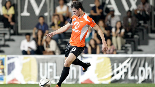 Phil Younghusband of Loyola FC in action against Global FC. Photo by Mark Cristino