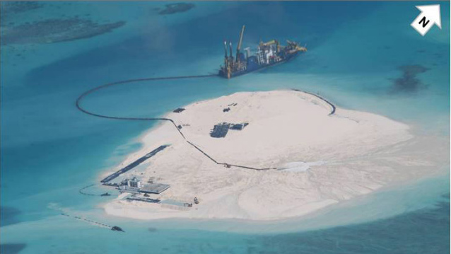 'JEOPARDIZING CASE.' The Philippines fears China is turning Mabini Reef into an island. This image dated Feb 25, 2014 shows ongoing reclamation activities. Photo courtesy of DFA