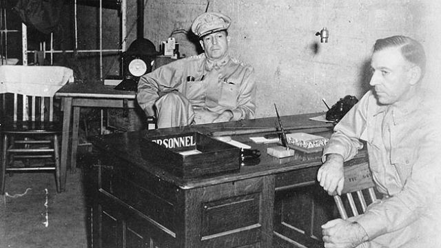 LIMITED OPTIONS. Generals Douglas MacArthur and Richard Sutherland in the headquarters tunnel on Corregidor, Philippines, 1 Mar 1942. Photo credit: US National Archives and Records Administration
