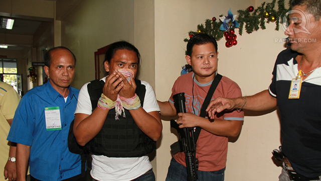 TO FACE THE COURT. Bong Andal, the alleged backhoe operator in the Maguindanao massacre, arrives in Manila. Photo courtesy of the CIDG.