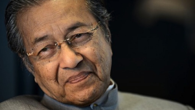 'DR. M' In a picture taken on June 14, 2012, former Malaysian Prime Minister Mahathir Mohamad speaks during an interview with AFP at his office in Kuala Lumpur. AFP PHOTO / Saeed KHAN