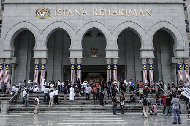 WAR OVER A WORD. The Malaysian Court of Appeals ruled that a Catholic newspaper cannot use the word "Allah." In this file photo, Malaysian Muslim gather outside the Court of Appeal in Putrajaya, Malaysia, 22 August 2013. EPA/Ahmad Yusni