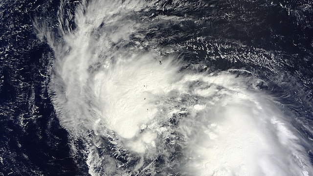 POLEWARD. A satellite image of Tropical Storm Man-yi (which later became a typhoon) on September 13, 2013, at 1:15 UTC. Man-yi later hit Japan. Image courtesy NASA Goddard MODIS Rapid Response Team