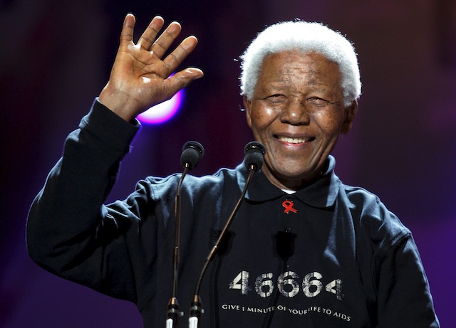 A file picture dated 02 July 2005 shows South African former president Nelson Mandela waving to the crowd at the Africa Standing Tall Against Poverty concert linked to Live 8 in Johannesburg, South Africa. Photo by EPA/Jon Hrusa
