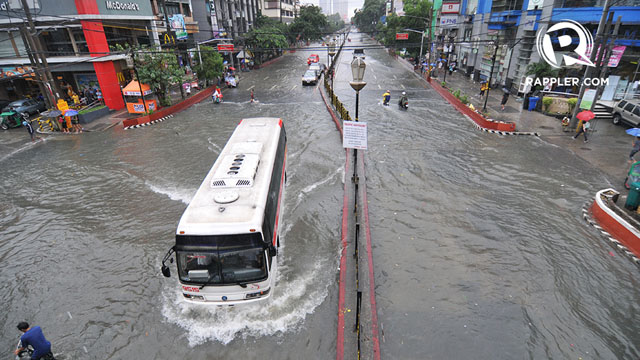 SUBMERGED. Rains have pummeled Manila and caused floods all over the capital. Photo by Arcel Cometa.