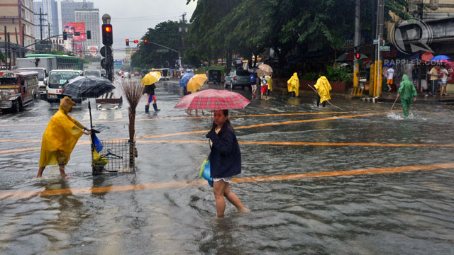 FACT OF LIFE. Commuters are forced to wade through flood waters along Espana. File photo by Rappler