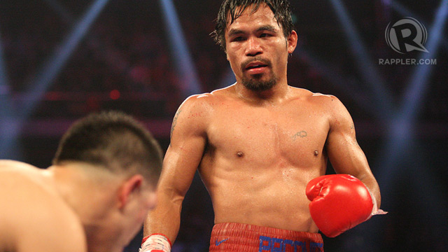 COMPASSION. Coach Freddie Roach says Manny's compassion got in the way of a knockout. Photo by Team Pacquiao / Mike Young