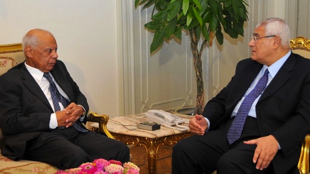 INTERIM LEADERS. Egypt's interim president Adly Mansour (R) meeting with with new-appointed Prime Minister Hazem al-Beblawi, on July 9, 2013 in the Egyptian capital, Cairo. AFP/Egyptian Presidency handout