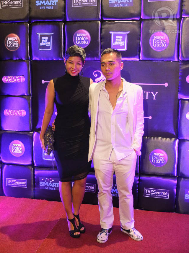 YIN AND YANG. TV host Mia Cabalfin wears a high-necked little black dress and musician-actor Marc Abaya pairs an all-white suit with casual Vans