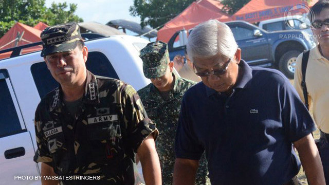 Defense Sec Voltaire Gazmin (R) at the command center of Task Force Kalihim.