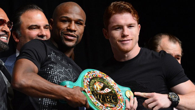 WHO'S YOUR PICK? Mayweather and Alvarez battle on Sunday. Photo by AFP. 