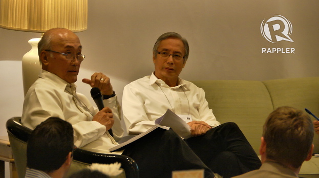 CONFLICTING IDEAS. Economists Gerardo Sicat (left) and Felipe Medalla (right) disagree on how powerful the president should be in order to push forward economic growth. Photo by Franz Lopez.
