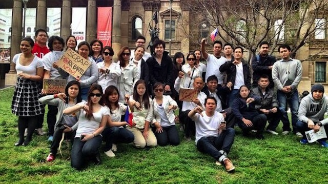 SCRAP PORK. Filipino students from Melbourne gather in front of the State Library of Victoria. Photo by Nina Araneta-Alana