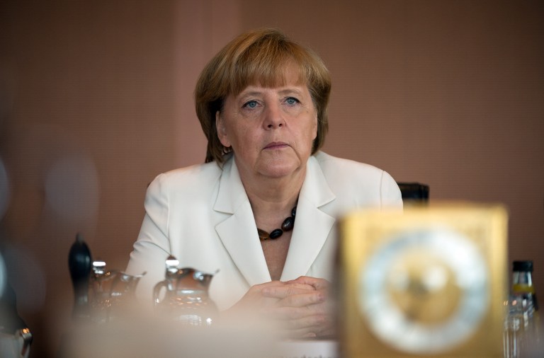 German Chancellor Angela Merkel attends the weekly government cabinet meeting at the Chancellery in Berlin on July 10, 2013. AFP / Johannes Eisele