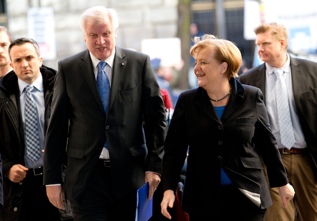COALITION BUILDING. Chairman of the German Christian Social Union (CSU) party, Horst Seehofer (L), and acting German Chancellor Angela Merkel of the Christian Democratic Union (CDU) party arrive at the 'Willy-Brandt-Haus', the headquarters of the German Social Democratic Party (SPD) for coalition talks, in Berlin, Germany, 26 November 2013. EPA/Kay Nietfeld