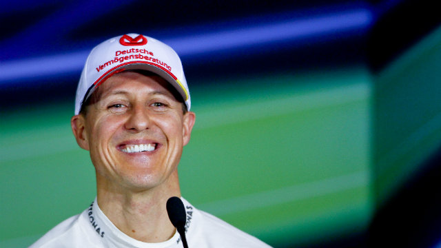 BETTER DAYS. Formula One racing legend Michael Schumacher smiling during a 2012 press conference in China. Photo by Diego Azubel/EPA