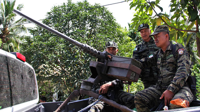 TRUCE? Members of the Moro Islamic Liberation Front claim the government violated the ceasefire accord. File photo by EPA/Richel Umel