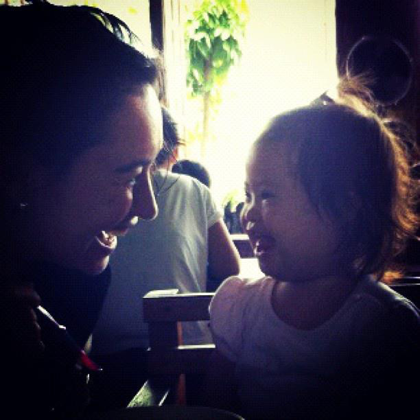 TEACHABLE MOMENTS ARE SPECIAL. The writer stares lovingly into the eyes of her daughter, Gellibean. Photo by Zoe Tan