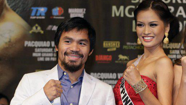 #PINOYPRIDE IN VEGAS. Cong Manny Pacquiao and Ms Philippines Janine Tugonon raise their fists to show that they are ready for their respective 'fights' this December. Photo from the Janine Mari Raymundo Tugonon Facebook page