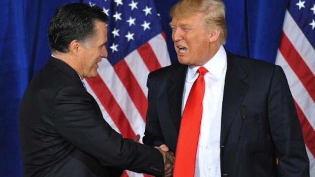 ALLIES. Businessman Donald Trump (R) shakes hands with Republican presidential hopeful Mitt Romney after announcing his endorsement of Romney at Trump International Hotel & Tower on February 2, 2012 in Las Vegas, Nevada. Photo courtesy of AFP