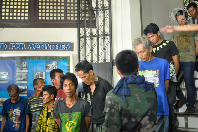 'TIRED ANG HUNGRY': Another batch of 15 MNLF rebels surrendered to combined forces of the military and the police. Photo by LeAnne Jazul