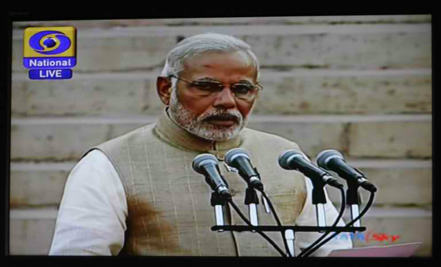 SWORN IN. In this frame grab taken from Indian state television Doordarshan, Narendra Modi takes the oath of office as he is sworn in as India's Prime Minister in New Delhi on May 26, 2014. AFP PHOTO/DOORDARSHAN 