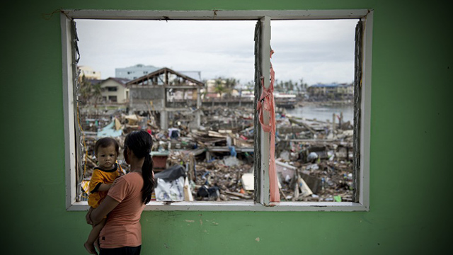 VICTIMS AGAIN? Thousands of Filipinos lose their homes due to Super Typhoon Yolanda (Haiyan). Rehabilitation Secretary Panfilo 'Ping' Lacson says 'unscrupulous' officials have begun to take advantage of them. File photo by Odd Andersen/AFP