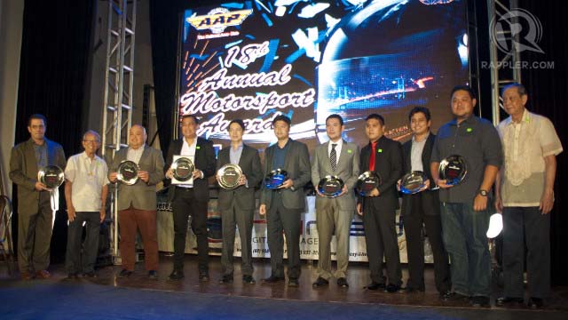 CLASS CHAMPIONS. Philippine touring car champions and runner-ups from divisions 1 to 3 hold their trophies: (from left to right) Leo San Juan, Dondon Portugal, William Tan, Jeff Borja, Joey Pery, Enzo Pastor, Alan Arguelles, John Mark Ong