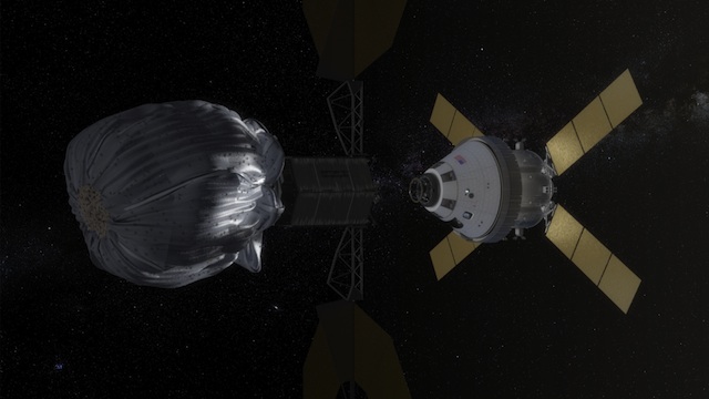 ASTEROID CAPTURE. This conceptual image shows NASA’s Orion spacecraft approaching the robotic asteroid capture vehicle. NASA illustration
