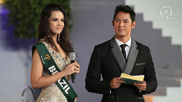 Miss Brazil listens to the question: What would you consider is your defining moment as a woman?