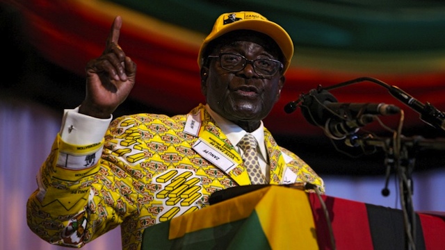 STRONGMAN. Zimbabwe president and leader of Zimbabwe African National Union-Patriotic Front (ZANU-PF) Robert Mugabe delivers a speech at his party's annual national conference in Gweru, on December 7, 2012. AFP/PHOTO JEKESAI NJIKIZANA
