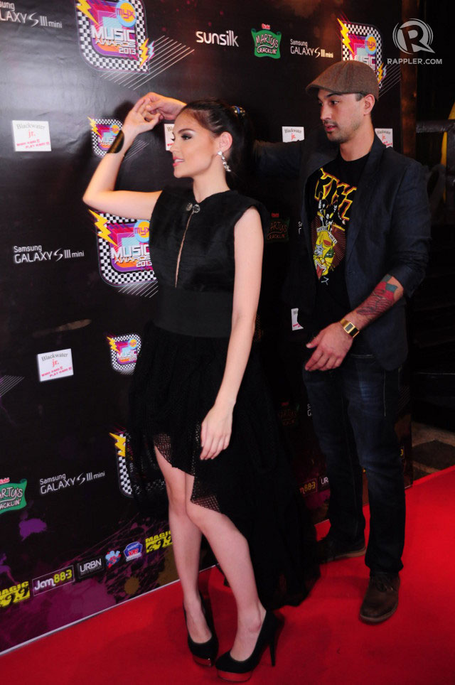 CUTE COUPLE. Rhian Ramos and KC Montero playfully dance on the red carpet