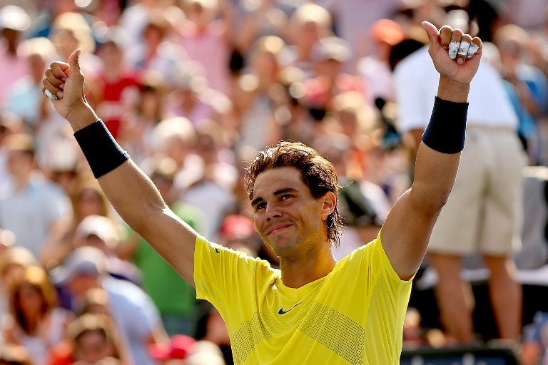 Rafael Nadal of Spain celebrates his win over Milos Roanic of Canada during the final of the Rogers Cup at Uniprix Stadium on August 11, 2013 in Montreal, Quebec, Canada. Matthew Stockman/Getty Images/AFP