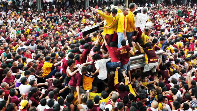 PUZZLING FAITH. Seeing themselves in the suffering and dark-skinned Christ, up to 8-M Filipinos flock to Quiapo for the Black Nazarene procession every January 9. File photo