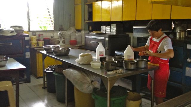 NORA LACSON IN HER mother’s kitchen, working on a generations-old recipe