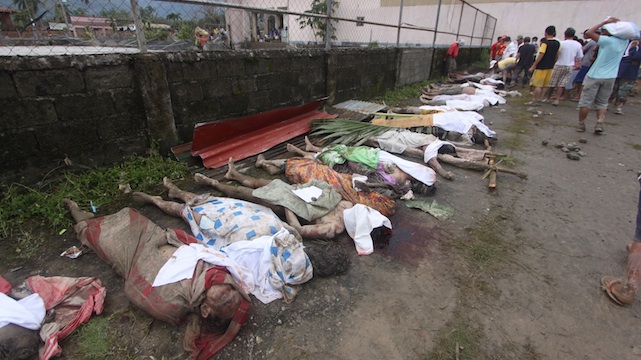 TRAGEDY IN COMPOSTELA VALLEY. Families struggle to identify their dead in New Bataan. Photo by Karlos Manlupig